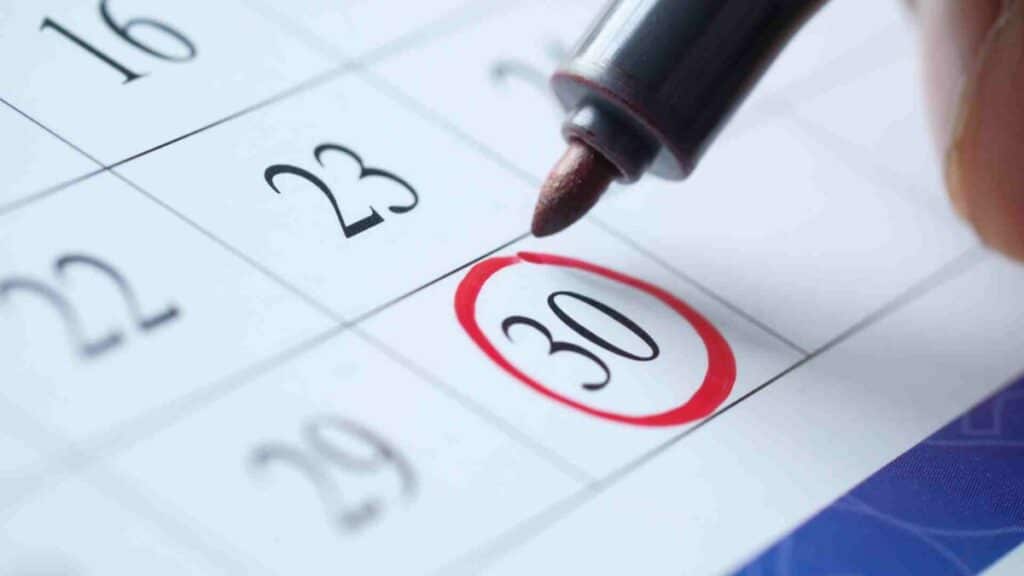 Waiting for visa application and marking it red on calendar on the 30th