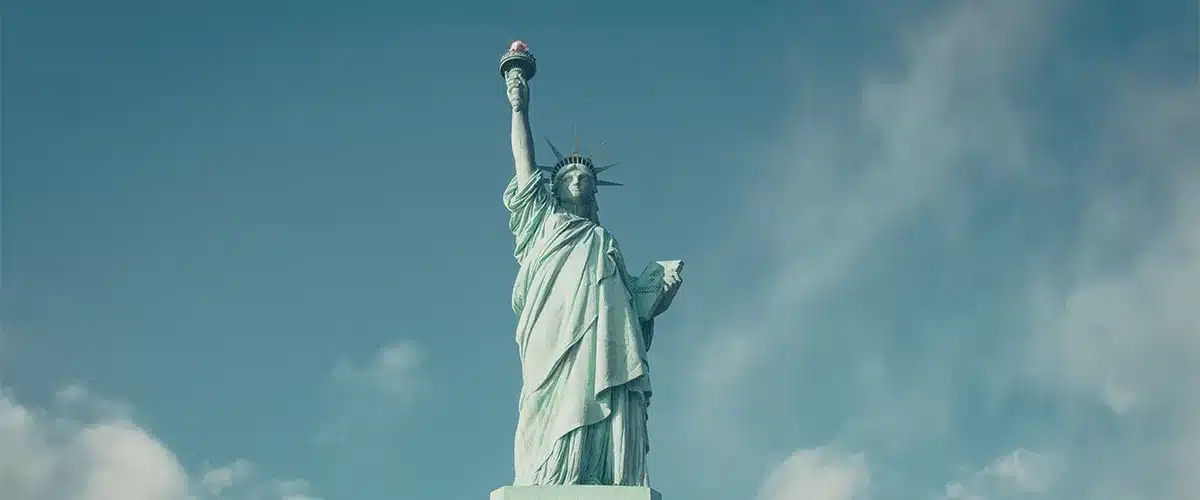The Statue of Liberty against a blue sky